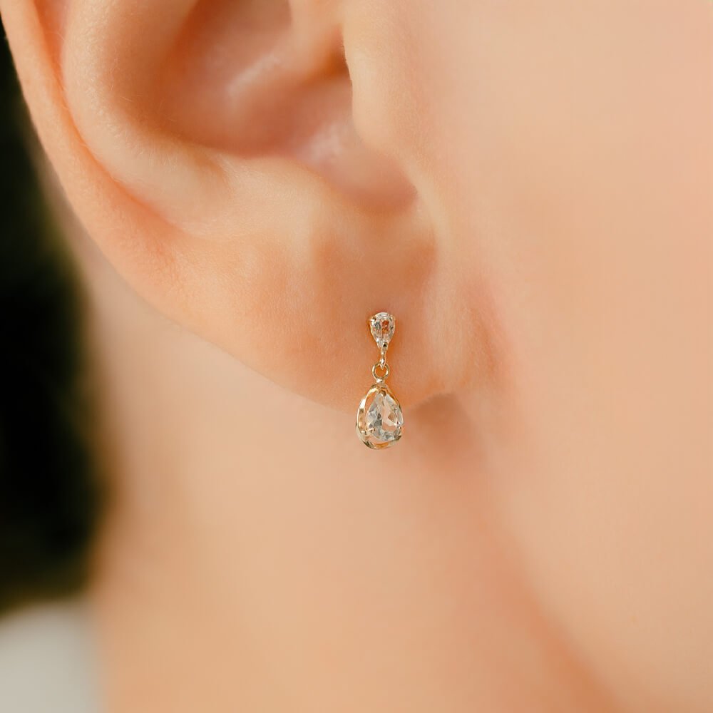 K10ホワイトトパーズ │ ペア―シェイプのトパーズが揺れるかわいい軟骨